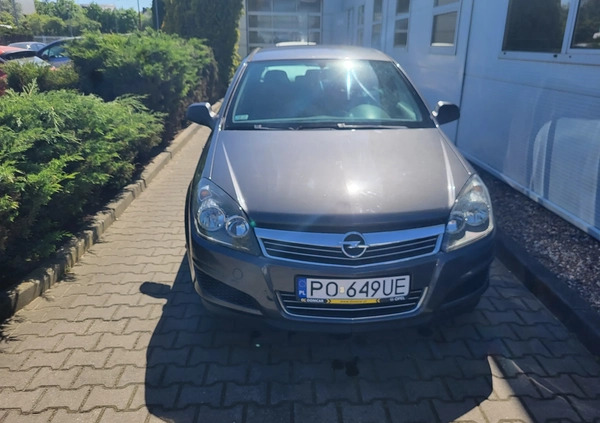 Opel Astra cena 18900 przebieg: 245000, rok produkcji 2012 z Poznań małe 121